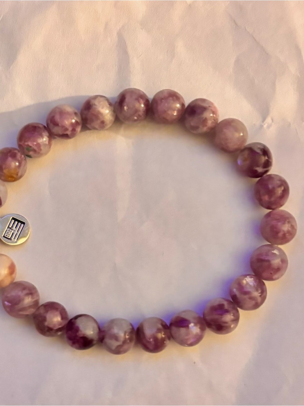 Purple Bead Stretch Bracelet with Logo Disc